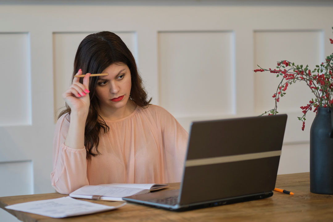 woman-researching-anxiety-on-laptop